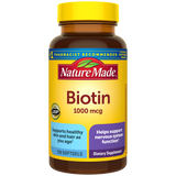 Nature Made Biotin 1000 mcg supplement bottle with Supports healthy skin and hair as you age, helps support nervous system function benefit label with a yellow cap.