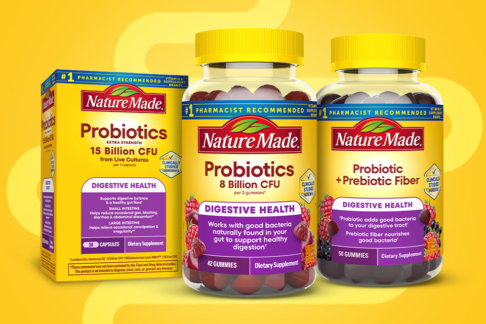 Nature Made Probiotic supplements on a yellow background.