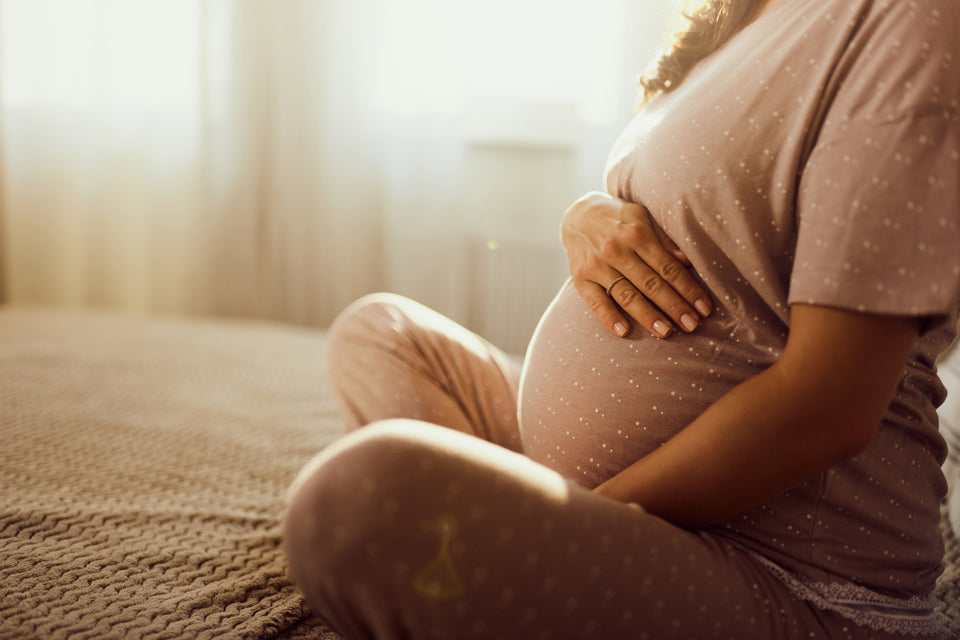 Pregnant woman in bed